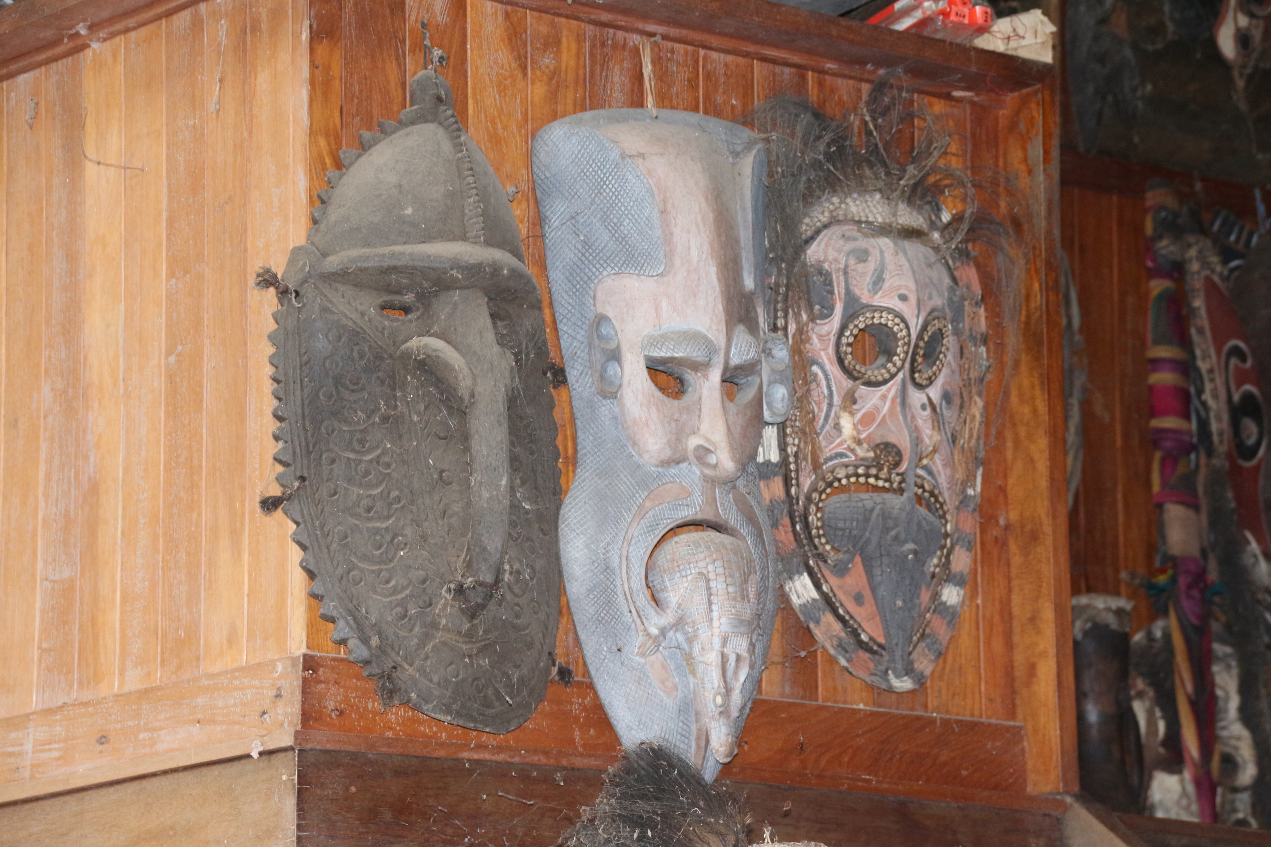 Famous wood carving masks, the ones with long nose is called a mosquito mask.