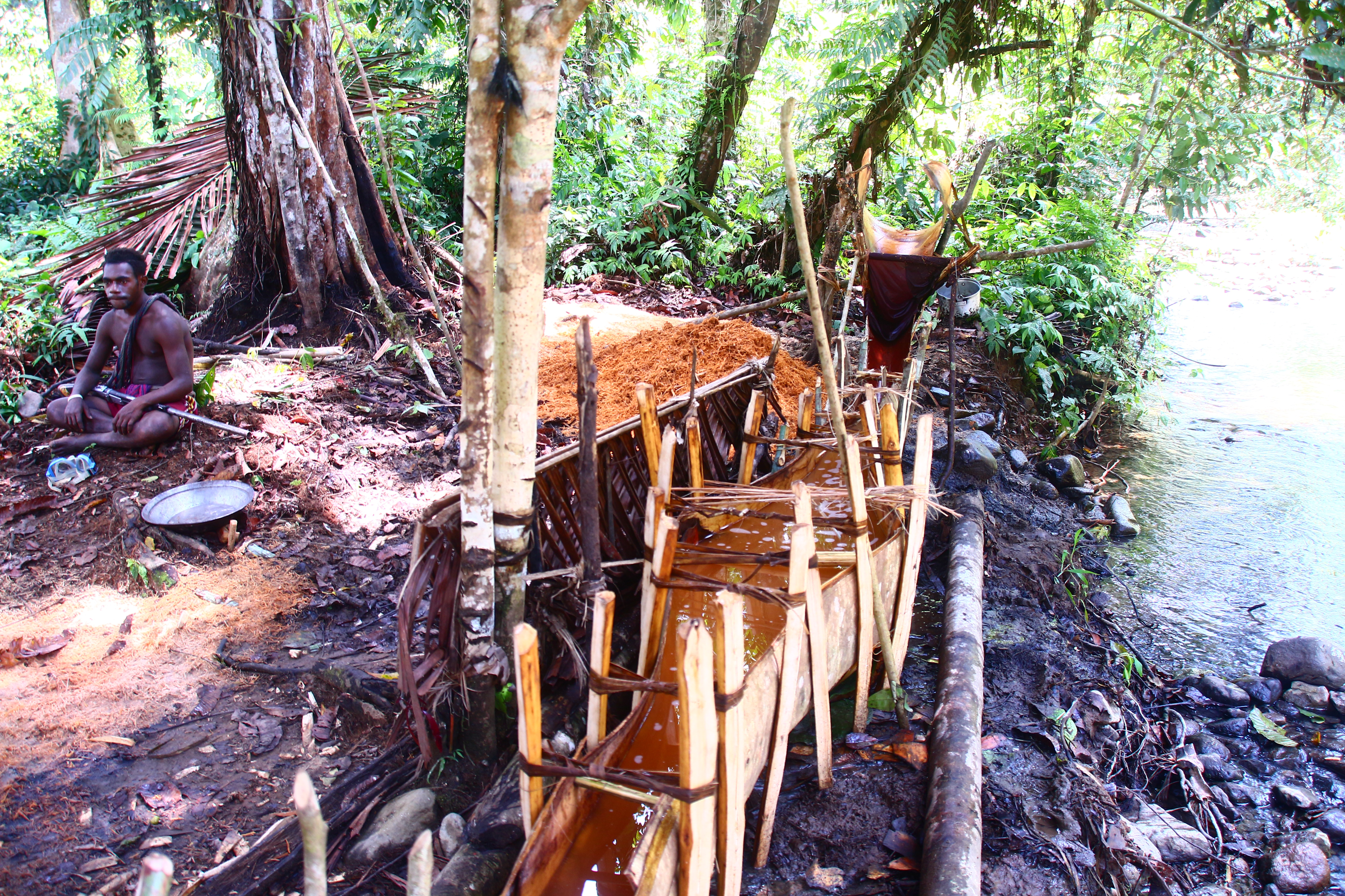 This is the sago processing system where the chopped up plant life goes into this system and drains for about half a day and then becomes the final product to eat.