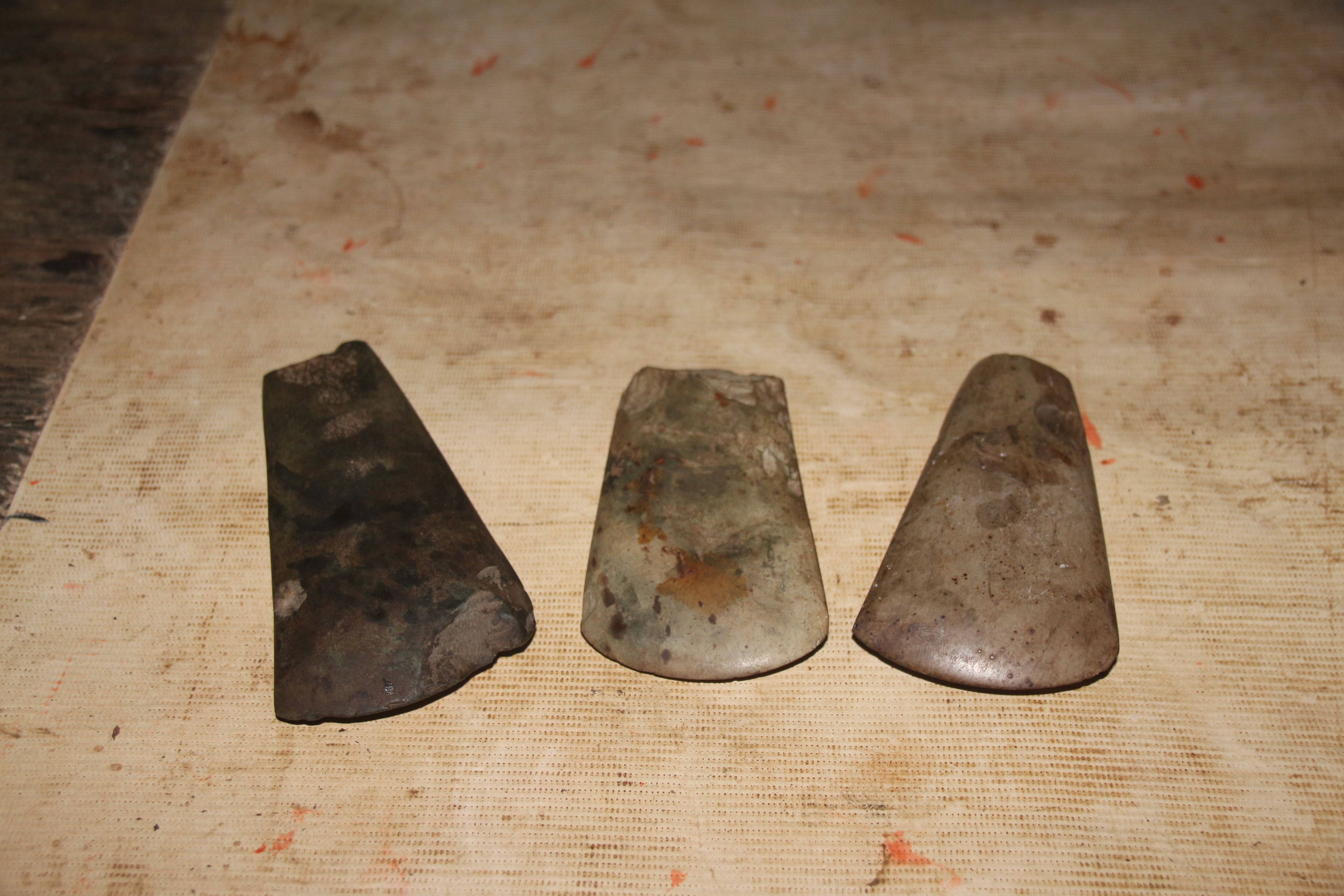 Old ancient axes made from hard stones three of which I had bought off the locals tribes. 
